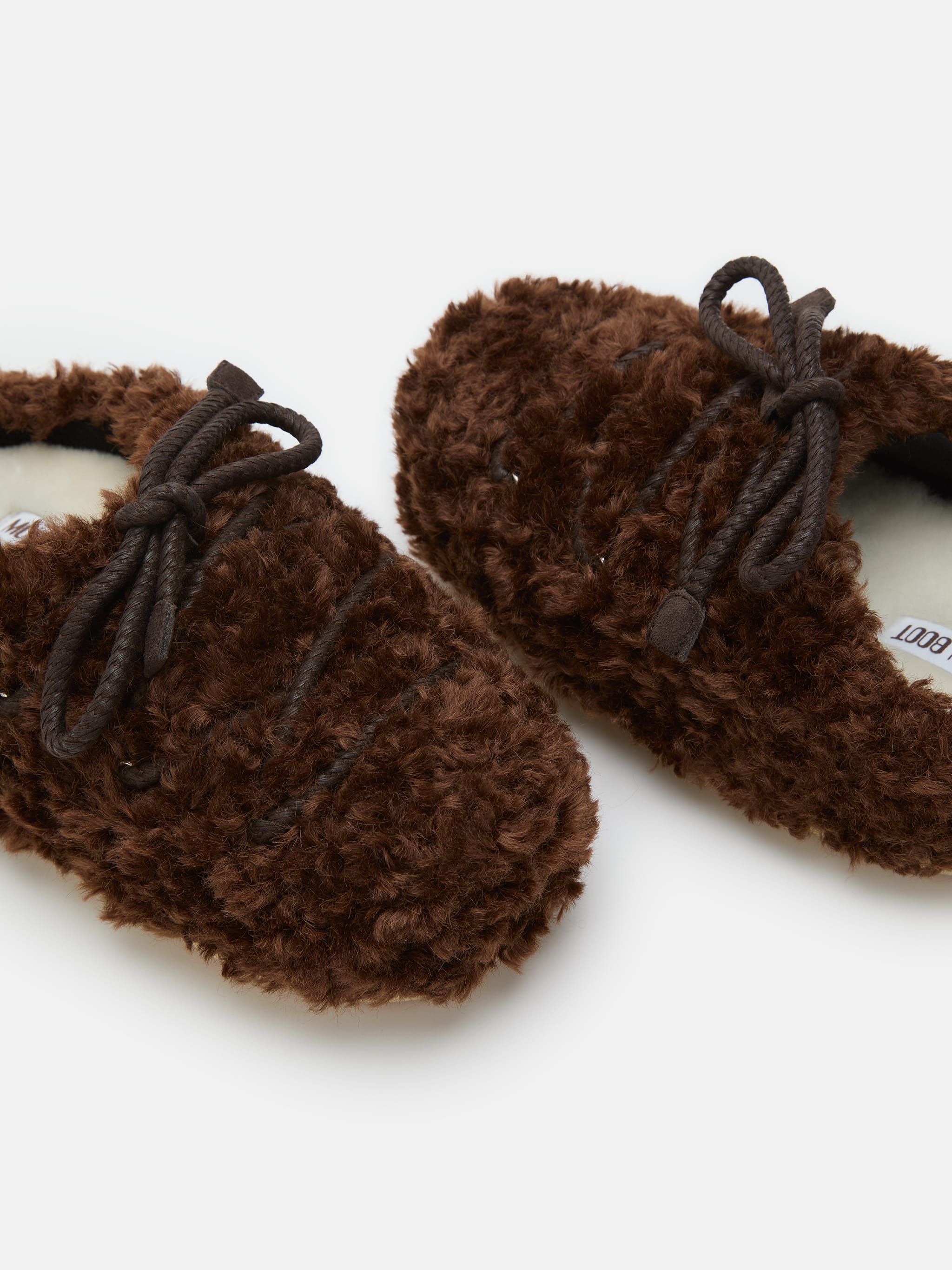 MULES ÉCLAIRÉS À BOUCLES MARRON FONCÉ