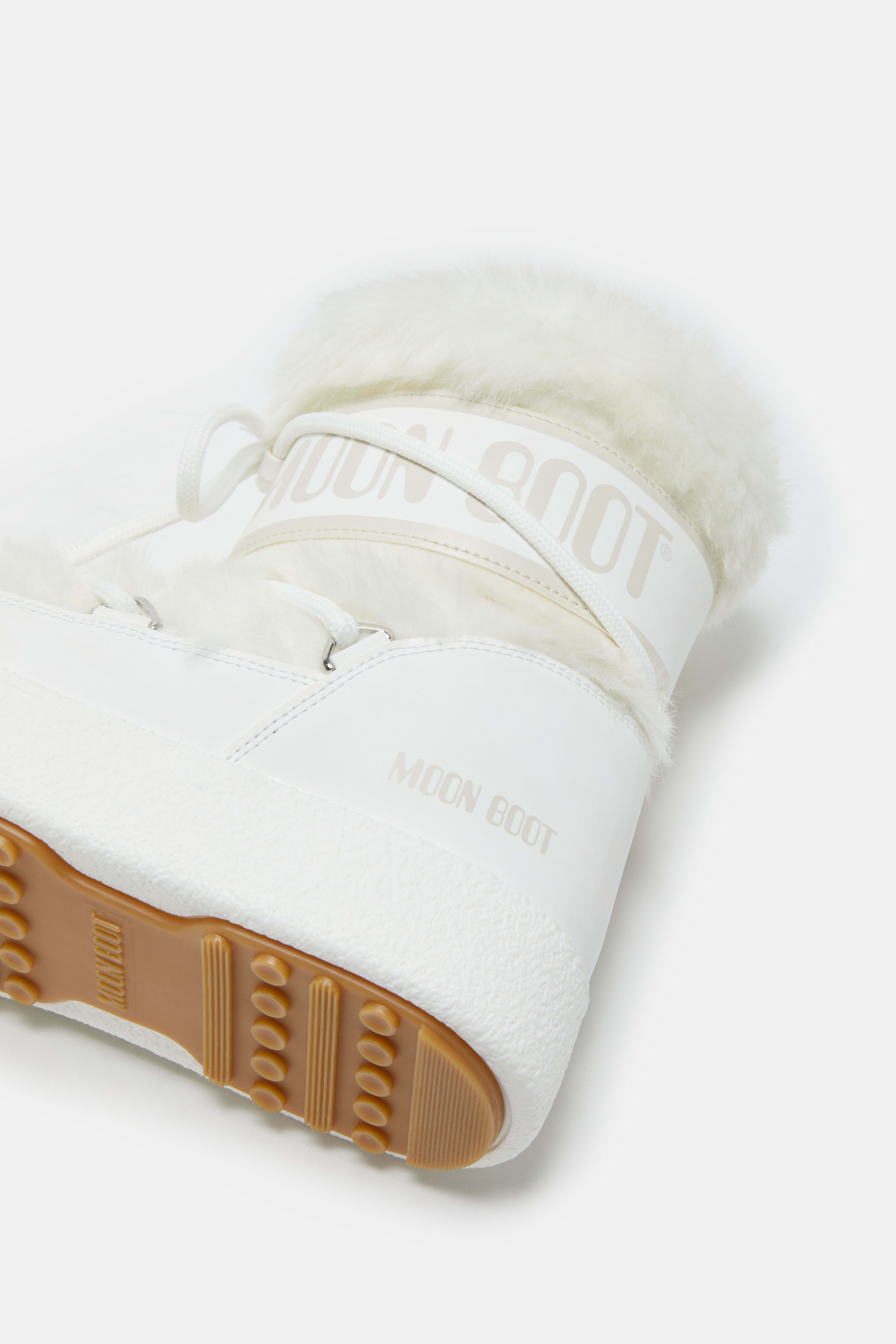 BOTTES LTRACK BAS BLANCHES EN FAUX-POIL