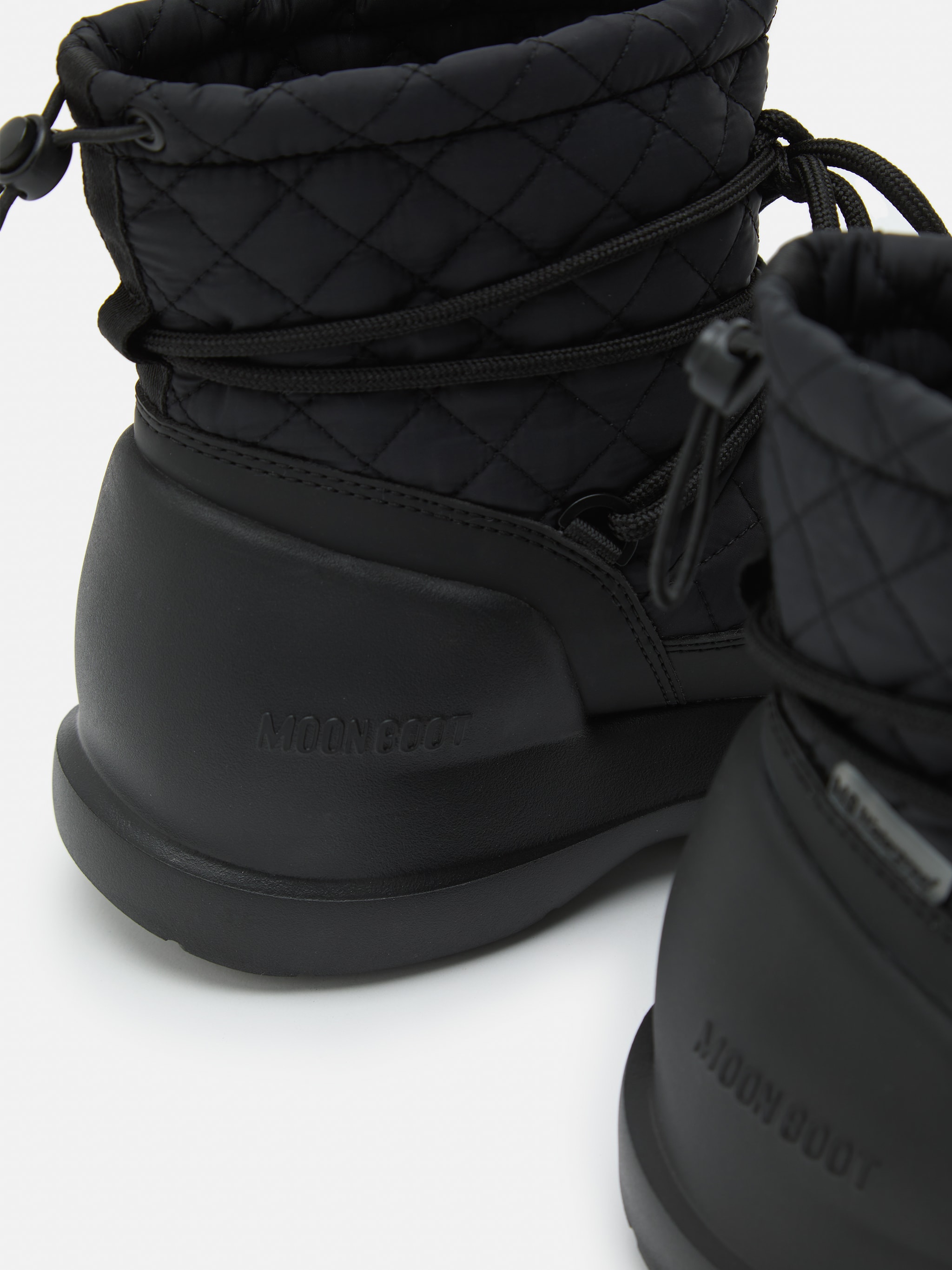 BOTTES MI-CHEVILLE MEZZALUNA NOIR QUILLÉE