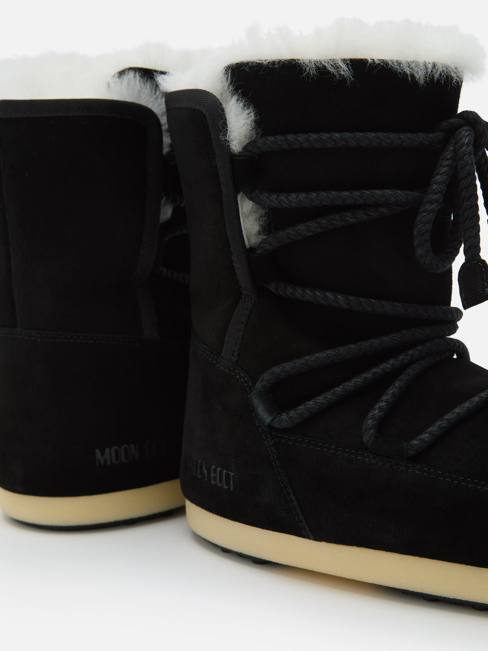 BOTTES EVX NOIR EN SUEDÉ ET SHEARLING