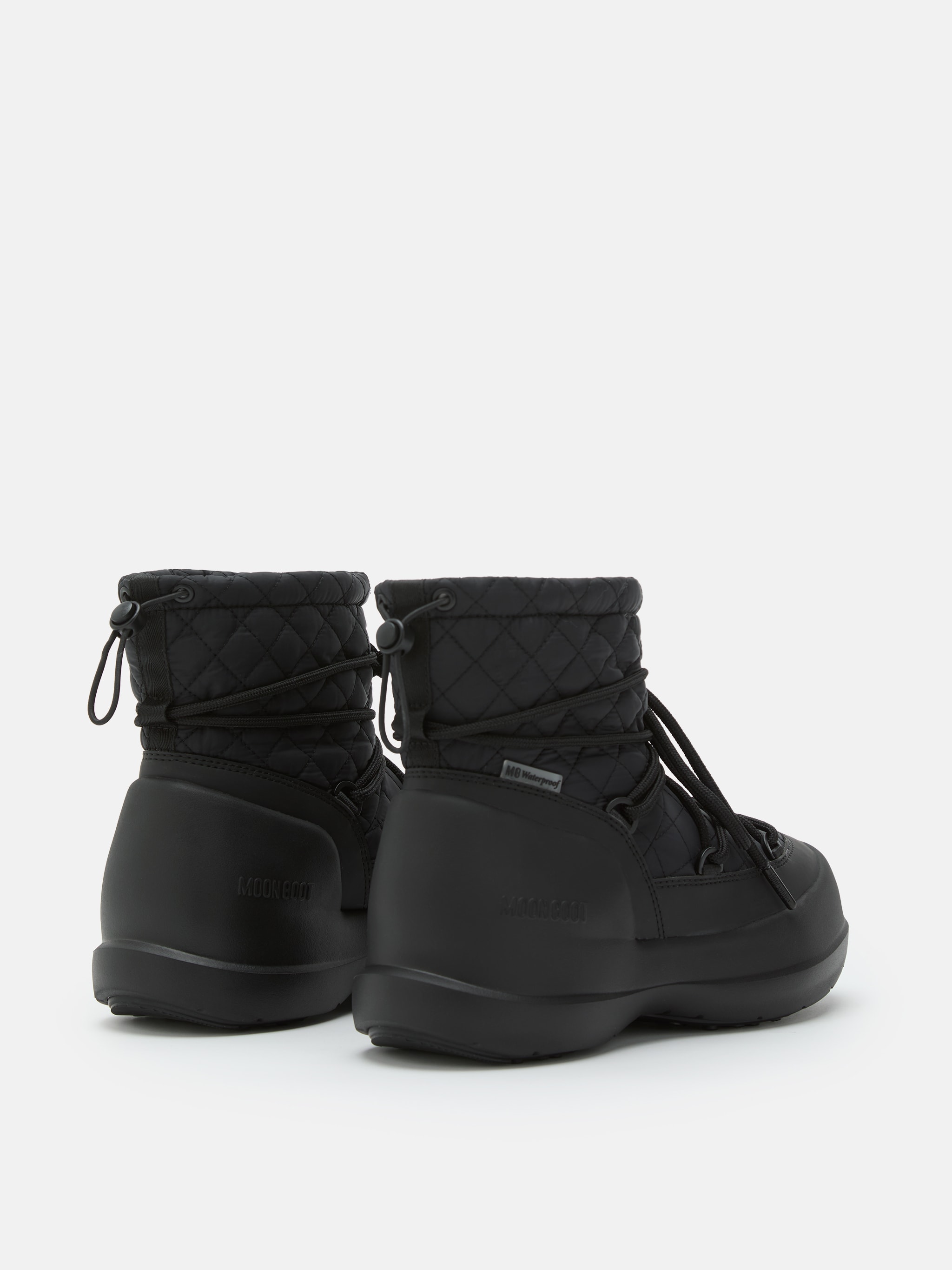 BOTTES MI-CHEVILLE MEZZALUNA NOIR QUILLÉE